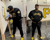 Man shown in two frames, one using a tufting gun on the left, and in an image on the right stands in front of his finished piece, a yellow and black small rug in the logo of the Pittsburgh Pirates