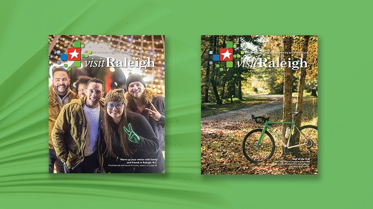 Two covers of the new Official Visitors Guide to Raleigh, side by side placed atop a green background; one cover has a group of people smiling at the camera, the other has a bicycle leaned against a tree along a greenway trail