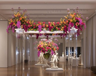 A large floral display sits in the lobby of the North Carolina Museum of Art as part of the annual Art in Bloom festival.