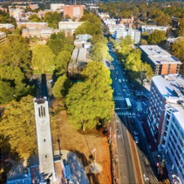 Aerial view of the The Memorial Belltower at North Carolina State University, plus Hillsborough St.