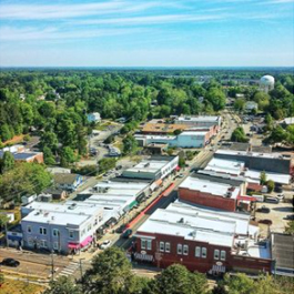 Aerial view of historic downtown Apex on a sunny summer day