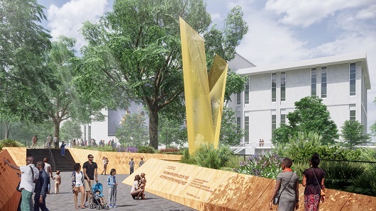 A rendering of future North Carolina Freedom Park, with walkways and greenery and a 40-foot-tall yellow sculpture in the middle that will be known as the Beacon of Freedom